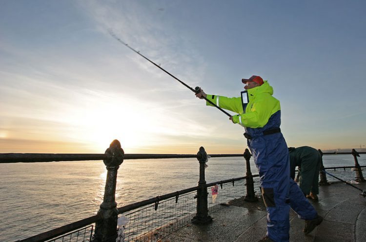 casting on Roker pier Sunderland at sunrise