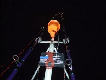 a lamp illuminates rods at night