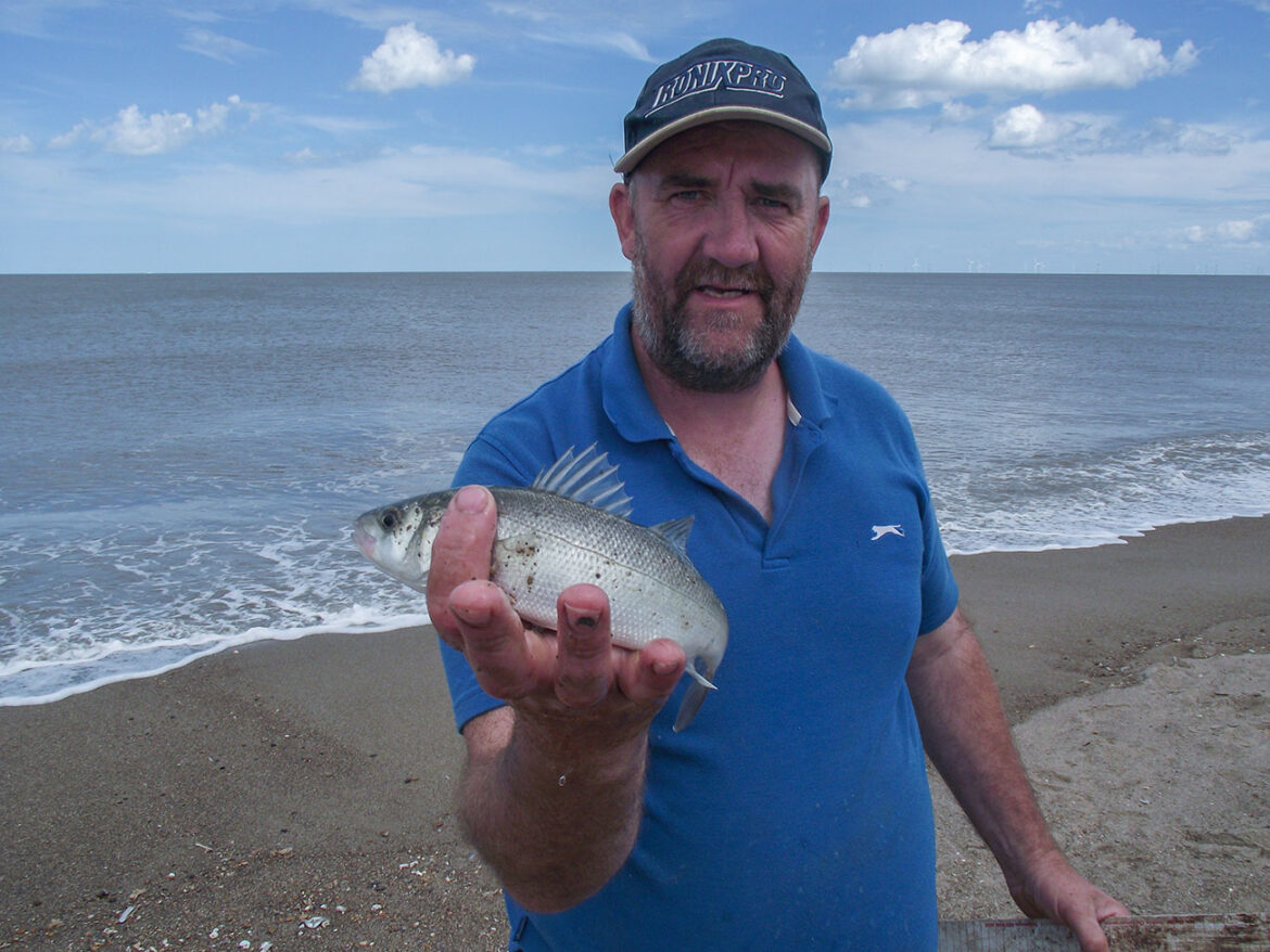 Match winner Paul Marshall with one of his schoolie bass