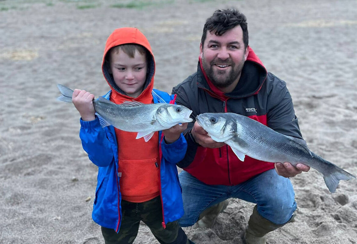 Hunter and Richard with a pair of bass