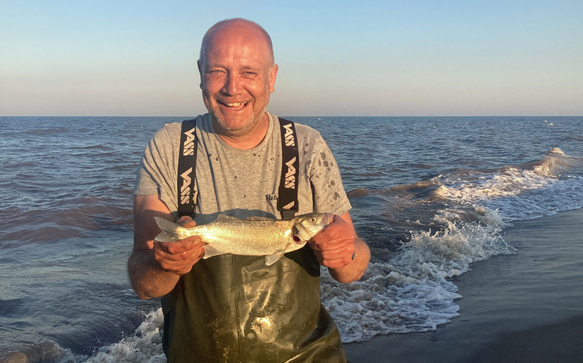 Ian with a schoolie bass
