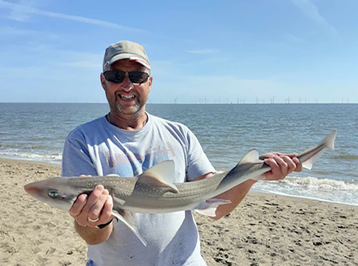 Adie Cooper with one of seven hounds hooked and six landed, plus a weever for the match win