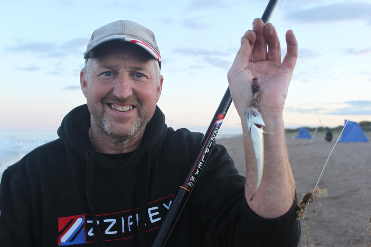 Adie with one of his 14 fish for 327cm