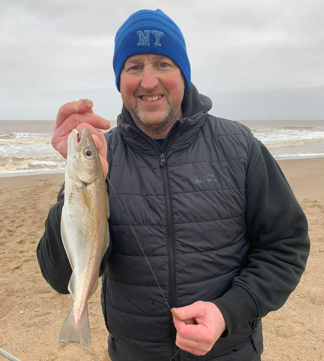 Match winner Adie Cooper with one of his whiting from a 333cm total length in hard conditions