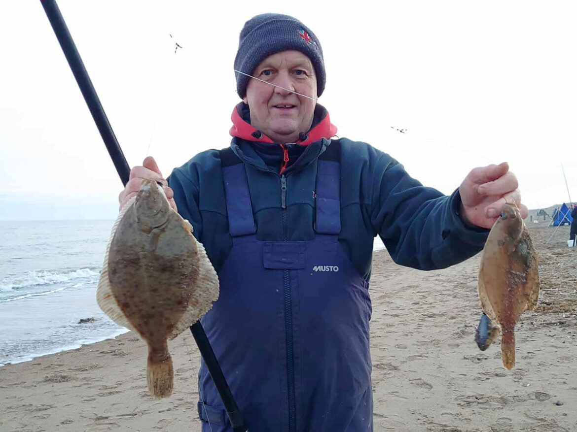 Match winner Karl Nangle with a flounder and Dab double shot, part of a 842cm total length result.