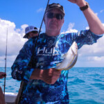 Dana with a yellowtail snapper