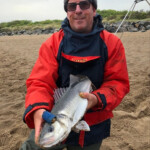 Paul Denholm with the longest round fish a bass of 57cm Paul Denholm with the longest round fish a bass of 57cm