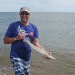 Match winner and hound magnet Adie Cooper with one of his smaller hounds Match winner and hound magnet Adie Cooper with one of his smaller hounds