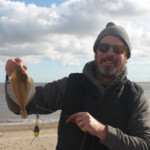 Paul Denholm looking happy with one of his dabs, but sadly he couldn't find a pesky whiting! Paul Denholm looking happy with one of his dabs, but sadly he couldn't find a pesky whiting!