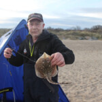 Match organiser Russell with a small thornback ray Match organiser Russell with a small thornback ray