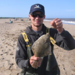 Jake Clowes with a 30cm flounder Jake Clowes with a 30cm flounder