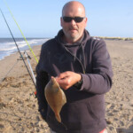 Tony Holmes with one of his flounders, tony also lost an unidentified big fish during the match Tony Holmes with one of his flounders, tony also lost an unidentified big fish during the match