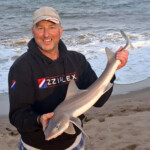 Match winner Aide Cooper with a hound Match winner Aide Cooper with a hound