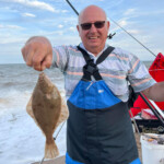 Kev Martin with one of his flounders Kev Martin with one of his flounders