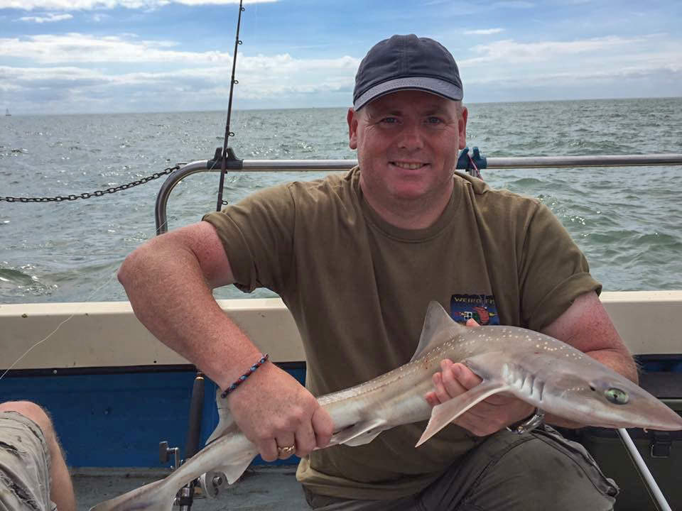 Colchester Sea Angling Club member Kevin Glover with a typical size smooth-hound