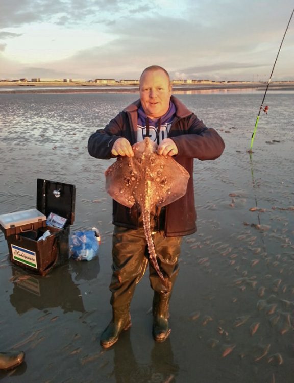 Eddie Moore with his first ray
