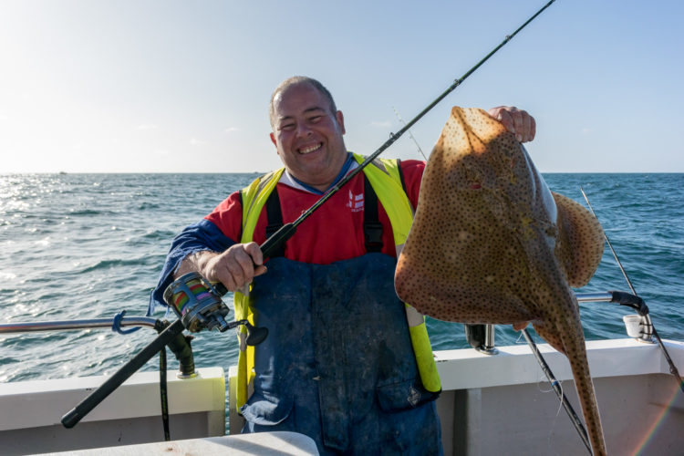 Colin Searles with a Kidney Bank blonde ray